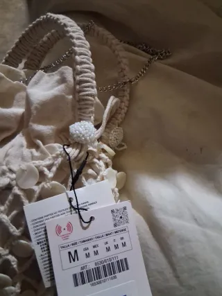 Bolso efecto nacarado con cadena