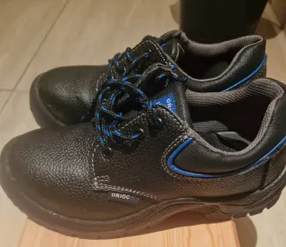 Zapatos de seguridad Oriocx negros y azules