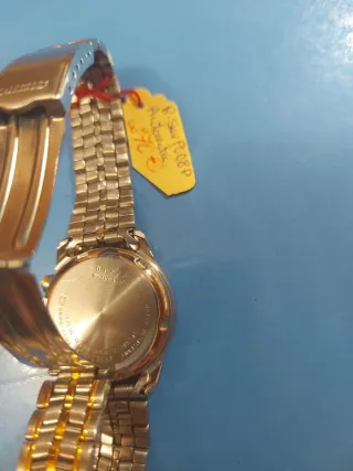 Reloj Seiko Kinetic dorado y plateado