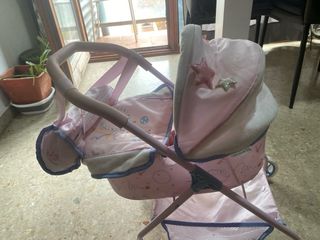 Cochecito de muñeca rosa regalo la muñeca