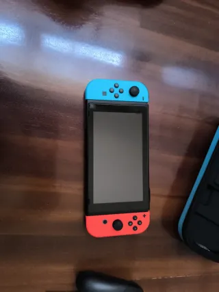 Nintendo Switch con accesorios y 6 juegos