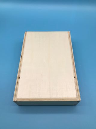 Caja de madera natural con tapa deslizante