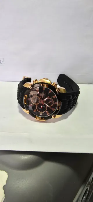 Reloj Marea Negro y Dorado