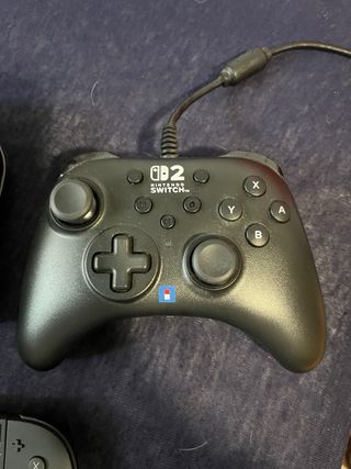 Nintendo Switch + Mando prácticamente nueva