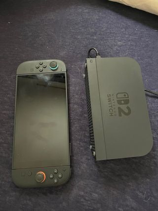 Nintendo Switch + Mando prácticamente nueva