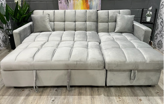 Sofá cama gris con almacenaje