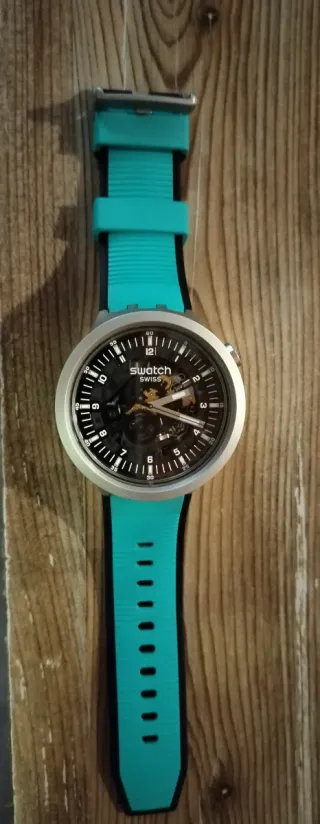 Swatch Dark Irony Negro y Turquesa