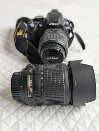 Cámara Nikon D3100 con bolso y cargador