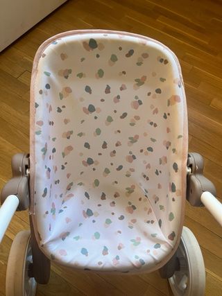 Carrito de muñecas juguete