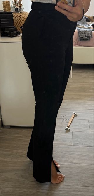 Pantalón vestir apertura en bajo