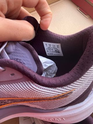 Zapatillas running Puma grises y naranjas