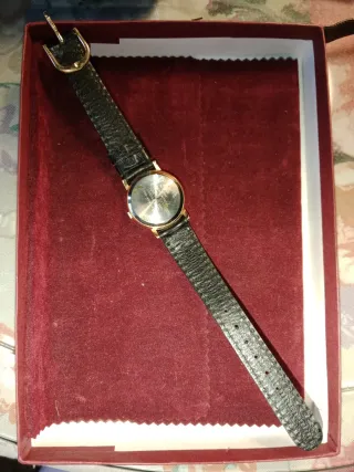 Reloj de pulsera mujer dorado y marrón