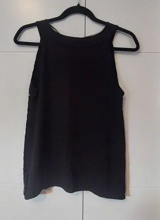 Blusa fiesta lentejuelas negra.