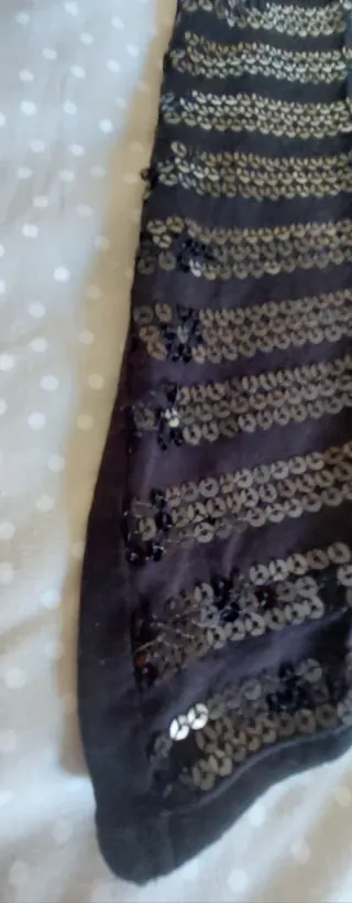 Blusa fiesta lentejuelas negra.