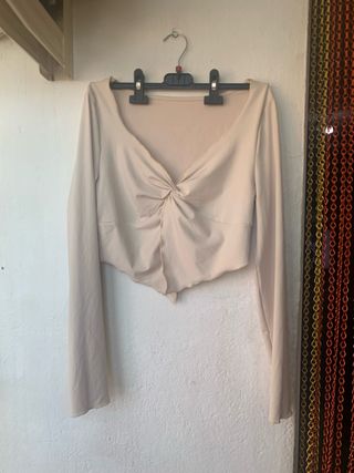 Top beige manga larga