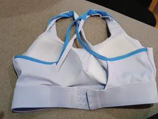 Sujetador deportivo blanco y azul