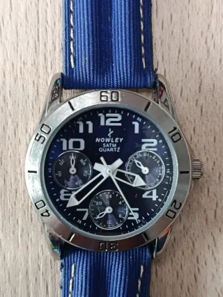 Reloj Nowley juvenil azul y plateado. nuevo