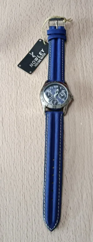 Reloj Nowley juvenil azul y plateado. nuevo