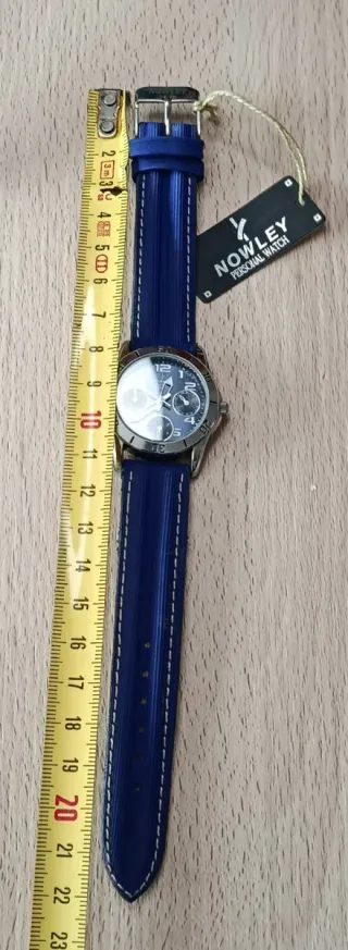 Reloj Nowley juvenil azul y plateado. nuevo