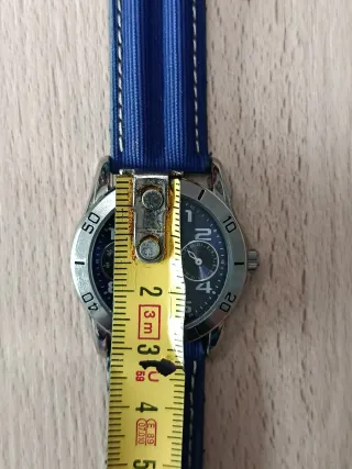 Reloj Nowley juvenil azul y plateado. nuevo