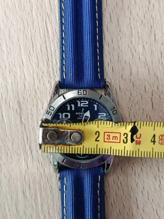 Reloj Nowley juvenil azul y plateado. nuevo