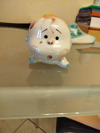 Salvadanaio bimbo in ceramica