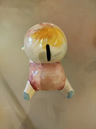 Salvadanaio bimbo in ceramica