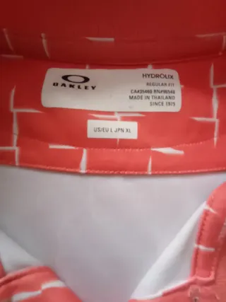 Polo Oakley Naranja Estampado