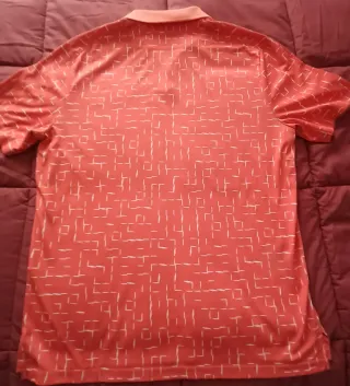 Polo Oakley Naranja Estampado