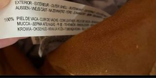 Bolso piel flecos de Zara