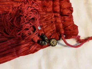 Bolso de fiesta granate con flecos