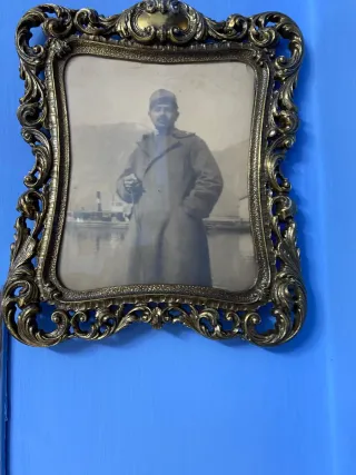 Cornice antica in bronzo con foto di epoca