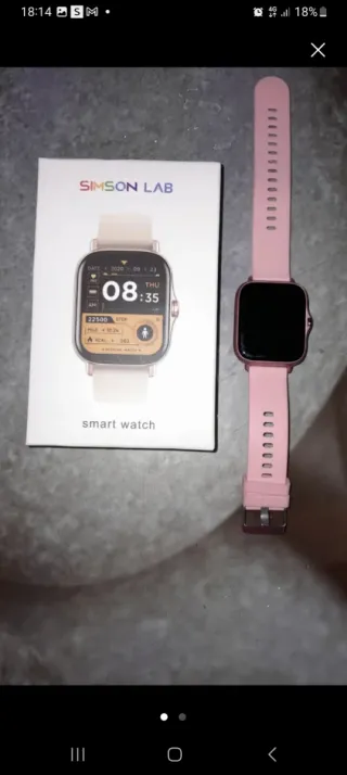 Reloj rosa con correas intercambiables