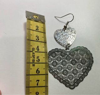 Orecchini doppio cuore con portagioielli