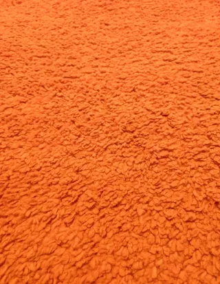 Alfombra redonda naranja pelo