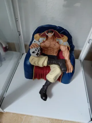 Figura coleccionista sentado