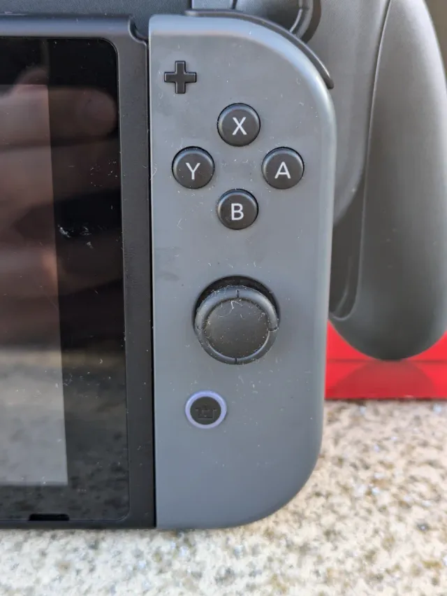 Nintendo Switch V2 con caja, funda y 2 juegos