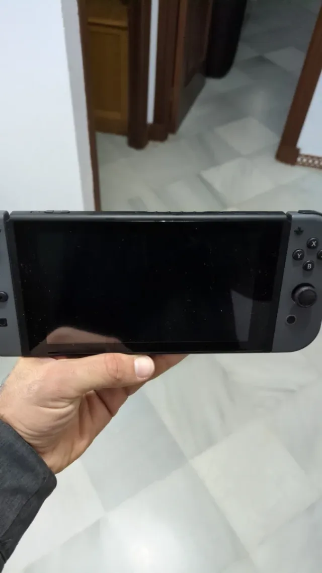 Nintendo Switch V2 con caja, funda y 2 juegos