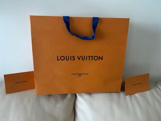 Bolsa Louis Vuitton naranja y 2 sobres