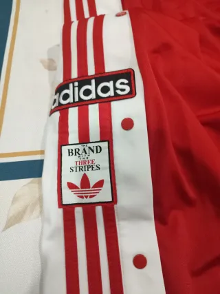 Tuta Adidas rossa a bottoni