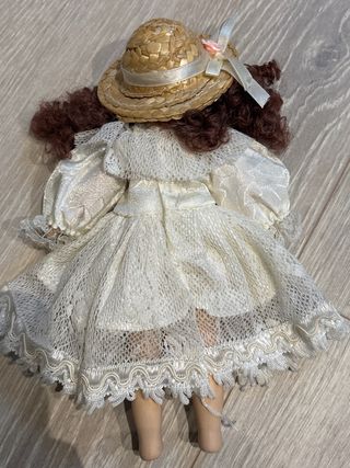 Vecchie bambole di porcellana