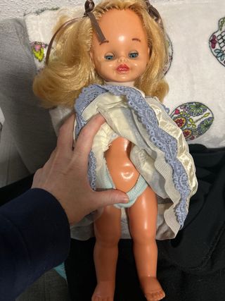 Muñeca antigua rubia ojos azules