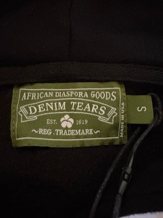 Chaqueta Corteiz X Denim Tears Negra