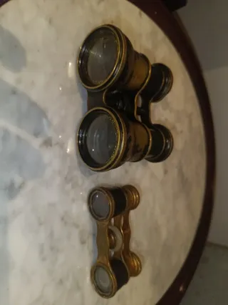 Prismáticos antiguos dorados