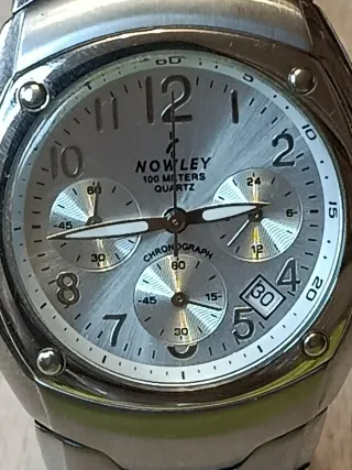 Reloj Nowley Cronógrafo Plateado.
