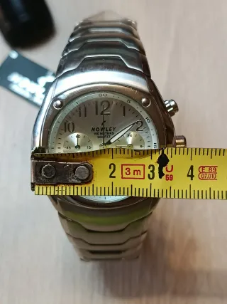 Reloj Nowley Cronógrafo Plateado.