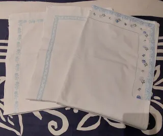 Lenzuola per lettino con bordi decorati