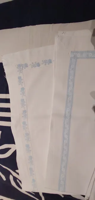 Lenzuola per lettino con bordi decorati