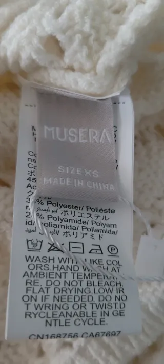 Mono crochet blanco roto espalda descubierta