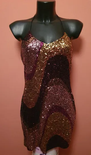 Vestido lentejuelas oro y morado.